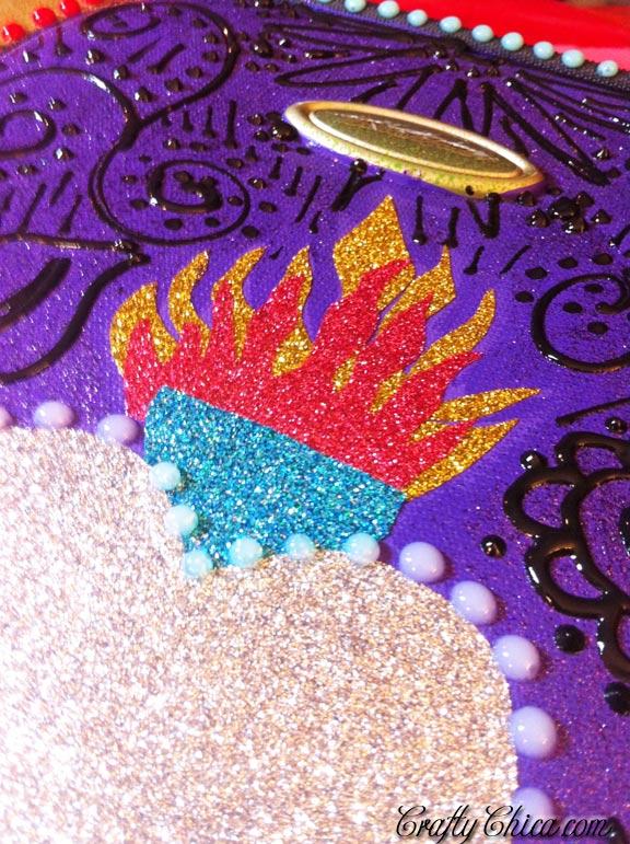 DIY glittered suitcase by Crafty Chica. #craftychica #glittercraft #paintedsuitcase