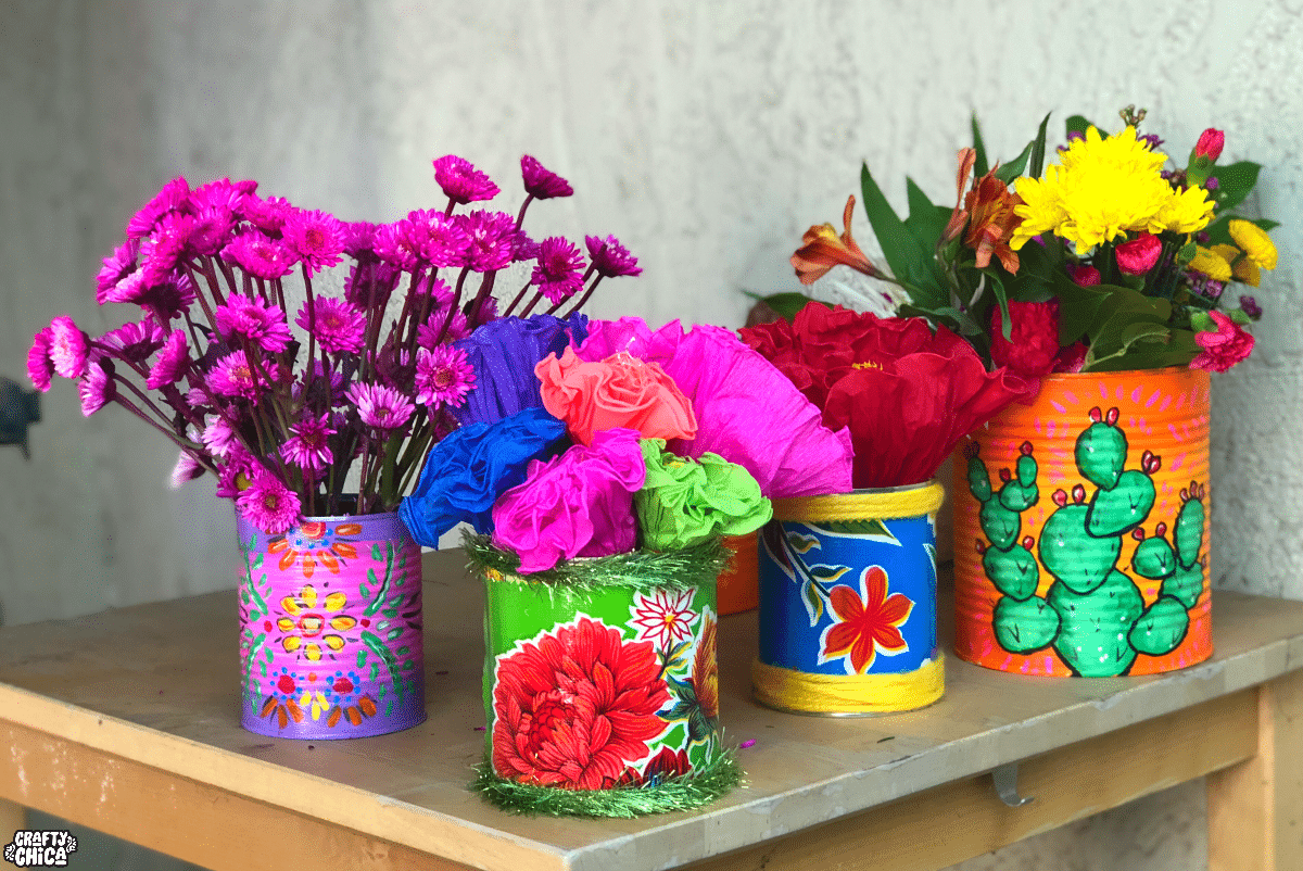 Painted tin cans by Crafty Chica.