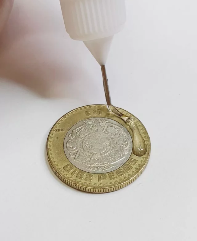 adding resin to coin