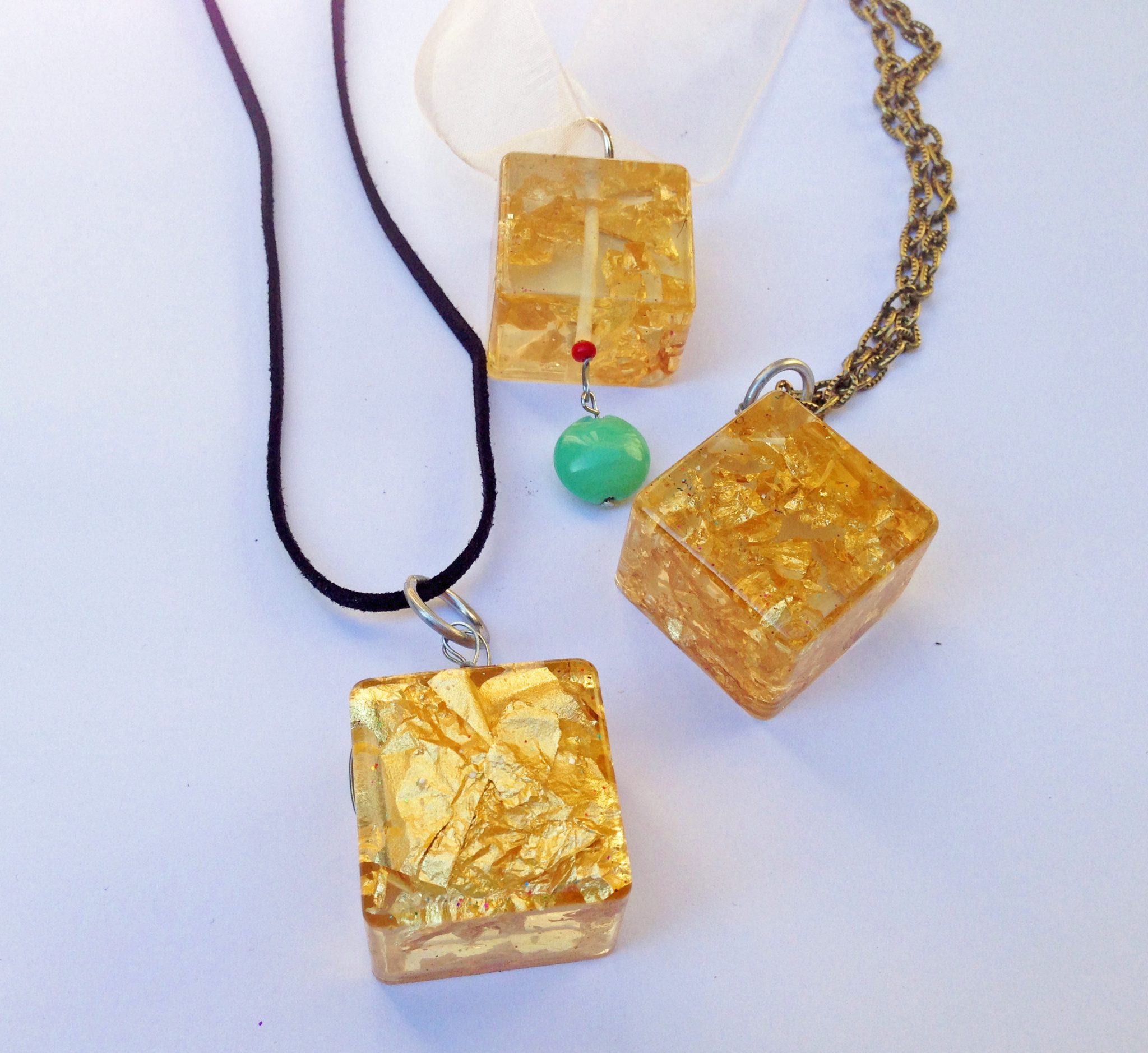Gold flakes in resin jewelry.
