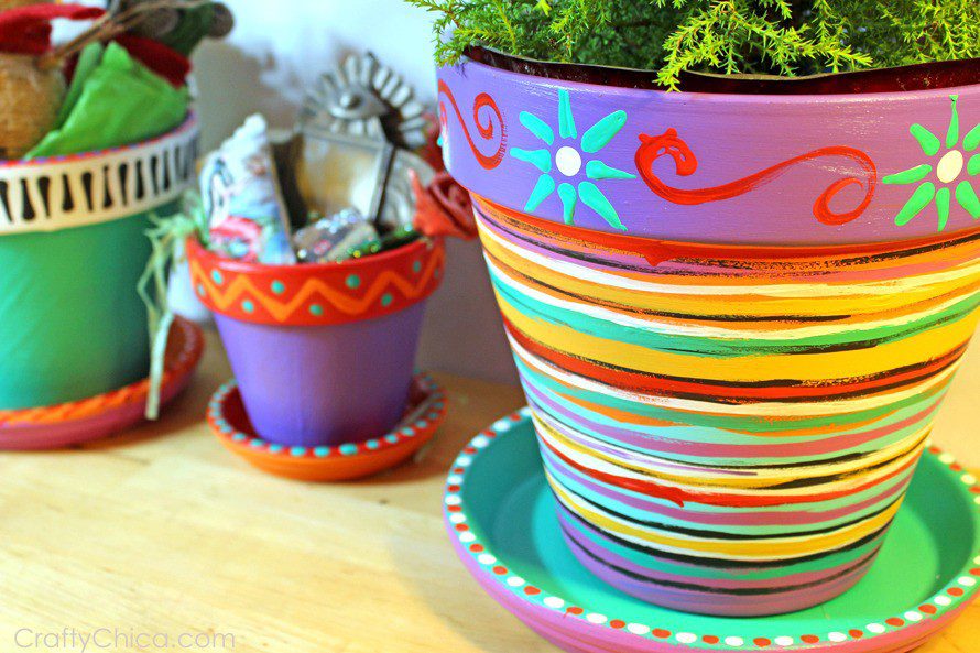 Painted flower pots by CraftyChica.com.