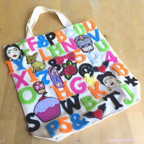 Glue felt letters to a canvas tote for an ultra bright look!