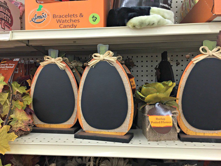 blank chalkboard pumpkin chalkboards on a store shelf. Craft is DIY Hand stamped Thanksgiving placemats