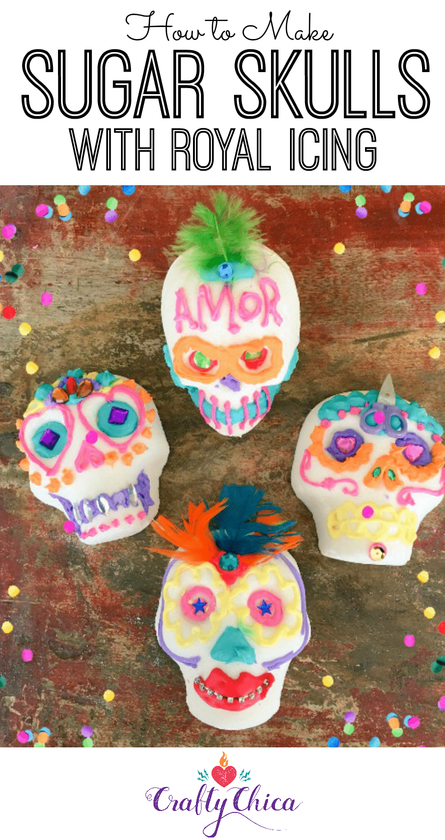 Decorated sugar skulls on a table with confetti.