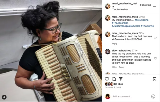 Monique playing the accordian