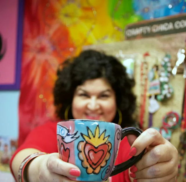 kathy holding a handpainted mug