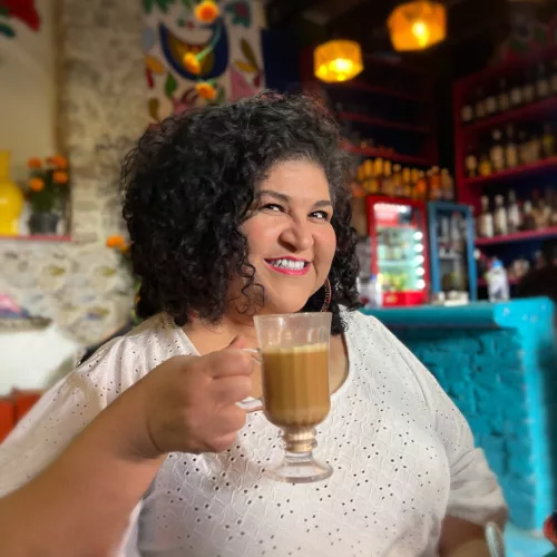 Latina style DIY by The Crafty Chica. Pictured: Kathy Cano-Murillo drinking coffee.